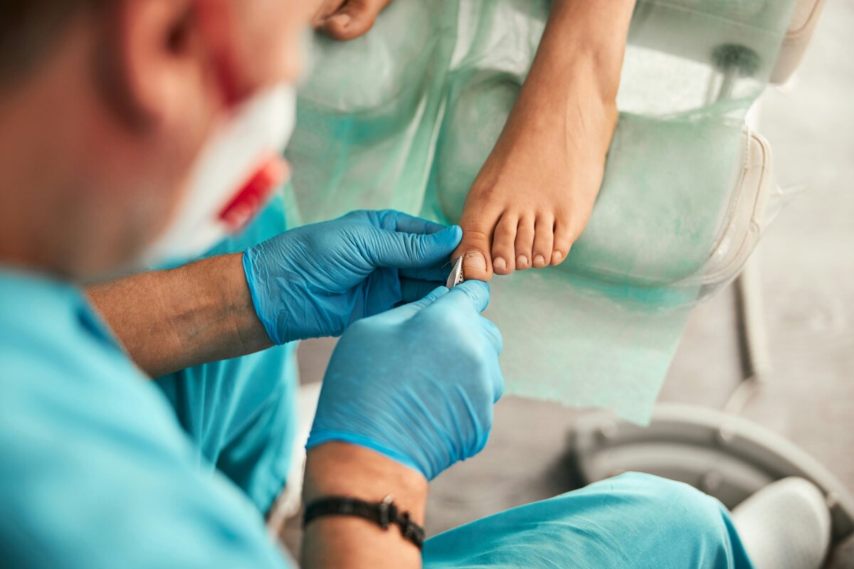 podiatrist performing nail surgery