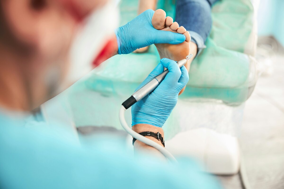 podiatrist performing routine podiatry